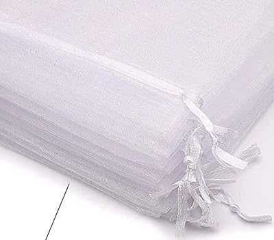 100pcs Clear Organza Bags 2.8" x 3.6" (7 x 9 cm), Drawstring Wedding Favor Bags, Luxury Jewelry Bags, Celebration Candy Bags (White).. hotep.ng is transforming Nigerian retail one click at a time. We bring you a curated selection of quality products from local artisans and global brands. Enjoy our commitment to authenticity, affordability, and excellent customer support.