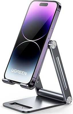 UGREEN Aluminum Phone Holder, Adjustable Foldable Cell Phone Stand, Compatible with iPhone SE 3 / iPhone 13 Mini / 13 Pro Max 12 Mini / 12 Pro Max / 11 XS XR 8, Galaxy S22 S21 S20 etc".. Elevate your shopping experience with hotep.ng, Nigeria's premier e-commerce destination. Browse through our extensive catalog of fashion, electronics, home goods, and more. Enjoy fast delivery and excellent customer service.