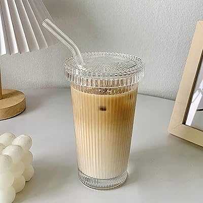 Striped Glass Coffee Mug with Lid and Straw, Cups for Water, Iced Coffee, Milk, Tea, Juice (A-Strip).. Experience the best of both worlds with hotep.ng: local charm and global trends. We offer an unparalleled range of products to enhance every aspect of your life. Enjoy the convenience of 24/7 shopping with our reliable e-commerce platform.